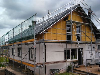 Wohnraumerweiterung auf bestehendes Flachdach mit Dachsanierung